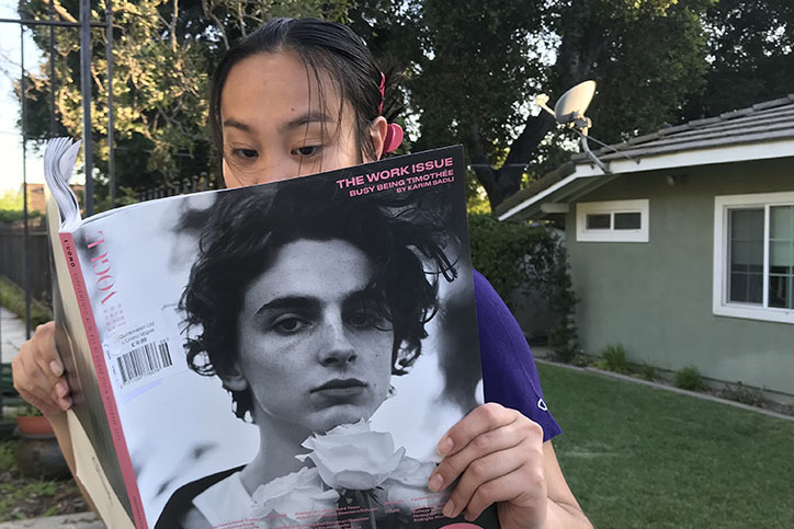 Not even this oversized, international edition of Vogue can contain the beauty of Timothée Chalamet. 