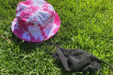 The author refers to the hue of the pink on this tie-dyed bucket hat as "Fitzpatrick Hibiscus."