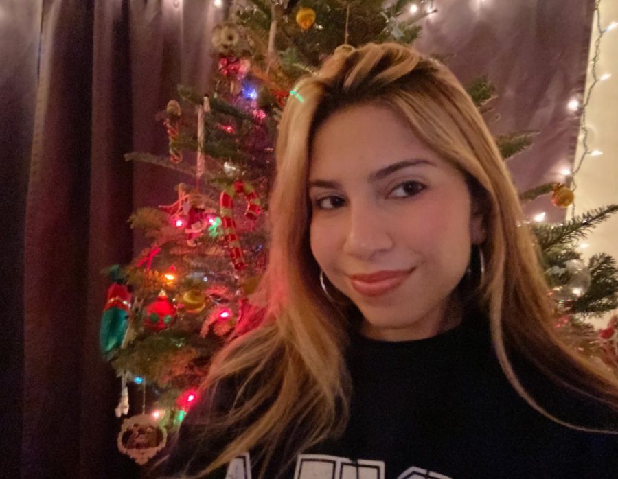 Angelina Arevalos 21 joins her fellow Tologs in sharing their Christmas traditions as she stands in front of her first ever real Christmas tree. 