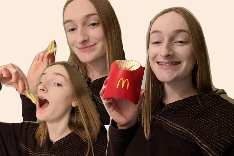 The author poses with McDonald’s fries, which she's called the winner of her fry quest. 
