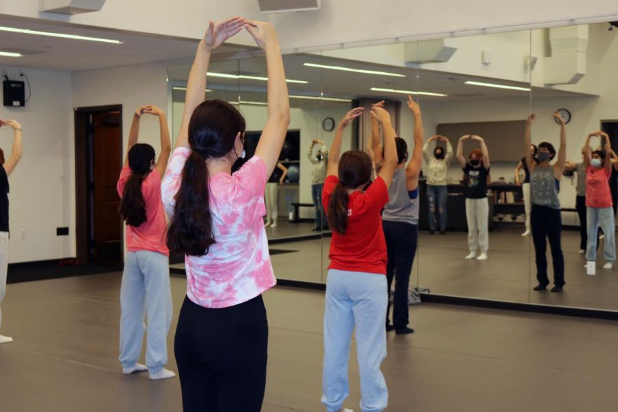 In the Hill's new, state-of-the-art dance studio, teacher Jessie Ryan (in front wearing gray) teaches students new choreography.