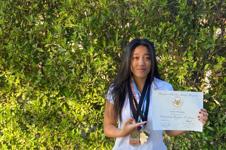 At her middle school graduation, Lena Hwang ‘23 (LEH-nuh HWONG, above) received a number of awards, though she didn’t know they were meant for her because her middle school principal kept mispronouncing her name. 