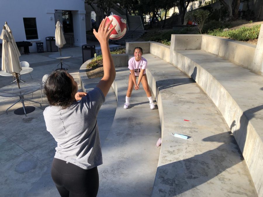 Varsity volleyball and San Gabriel Elite setter, Emily Smith ‘23, rallies with one of the junior varsity liberos who is an ex-San Gabriel Elite player, Ellamae Fortin ‘23.