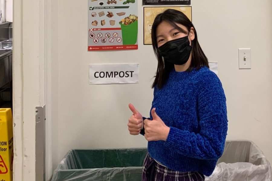 Ella Li 23 poses in front of the residential life hall’s composting bin after eating a delicious dinner in the Dining Hall. Here, Tologs are prompted to separate what remains on their plate into organic matter which will be composted, or trash. 
