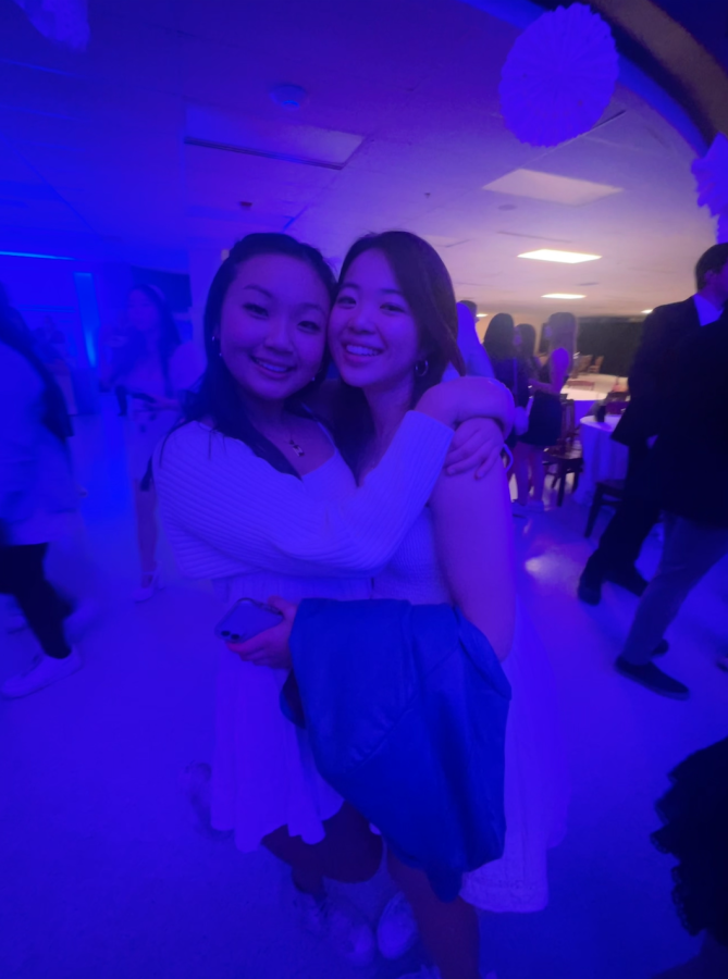 Having a good time with a friend I met at the conference at the winter ball. 
