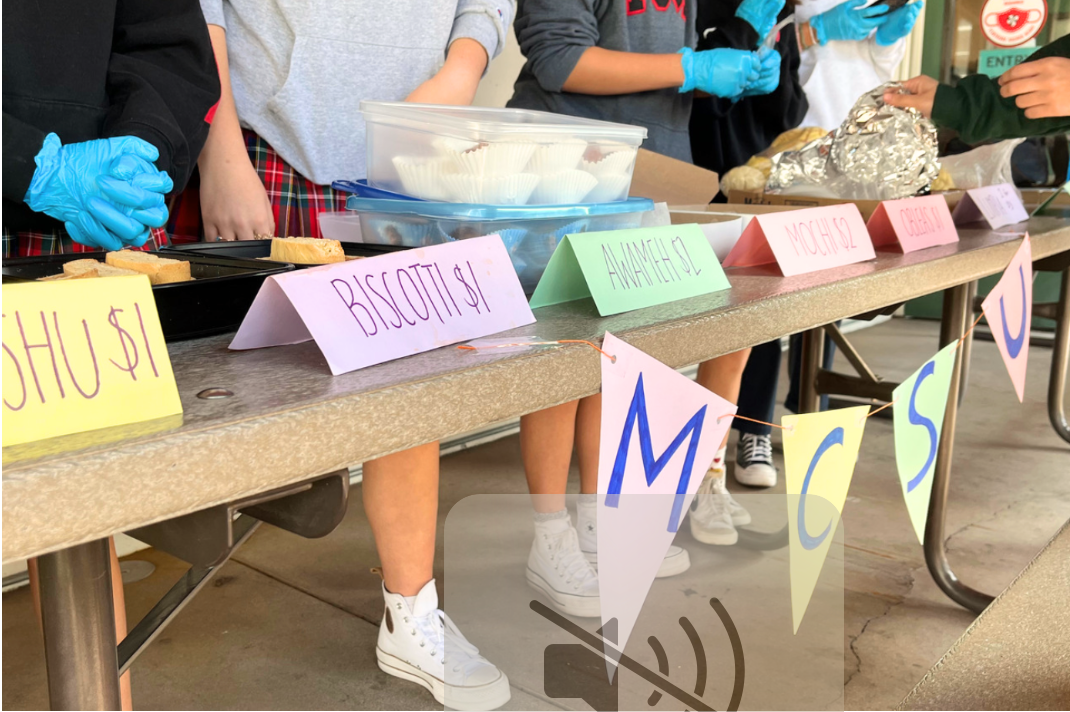 Members of the Multicultural Student Union host a bake sale to raise money to support immigrants in Los Angeles.
Photo by Fifi Joyner 24.