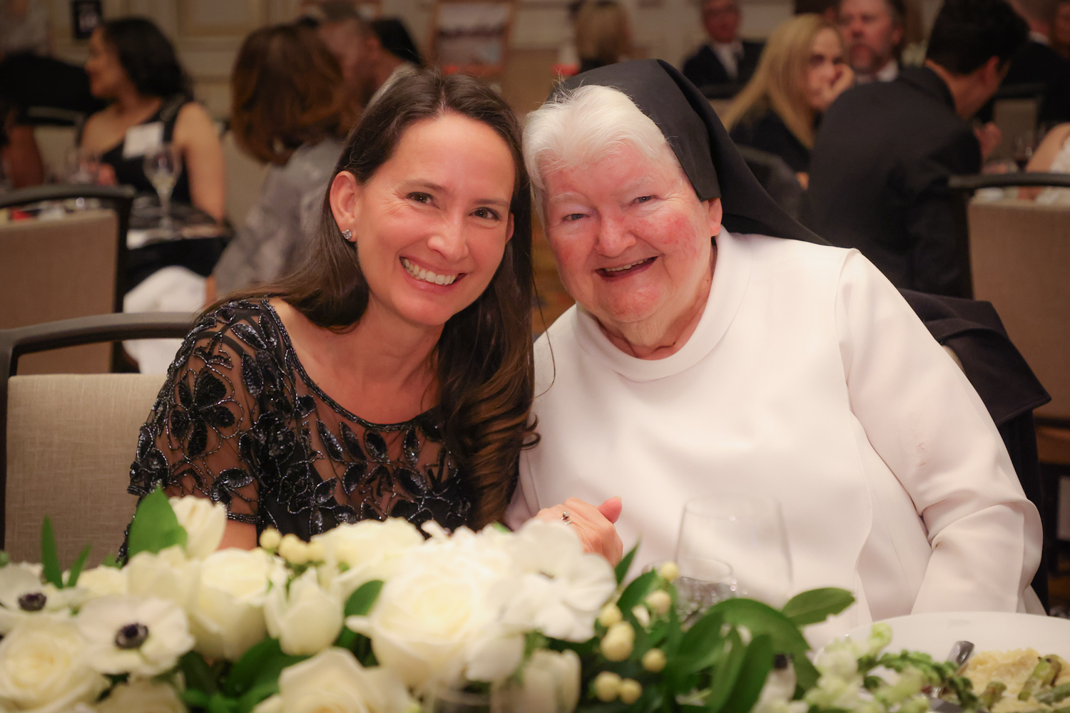 Mrs. Marlena Conroy and Sr. Carolyn enjoying each others company at The Black and White Ball. Picture taken by Keats Elliot. 
