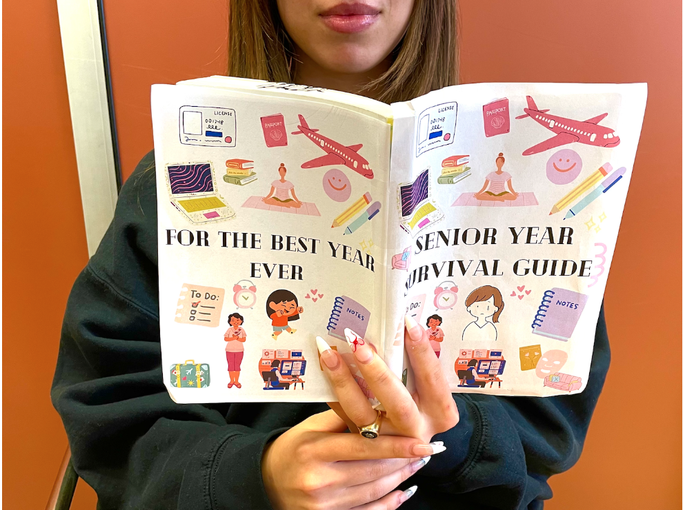 Sophia Garcia ‘24 pictured reading the ultimate Senior Year Survival Guide for the best year possible. Photo by Maria Boutros 24
