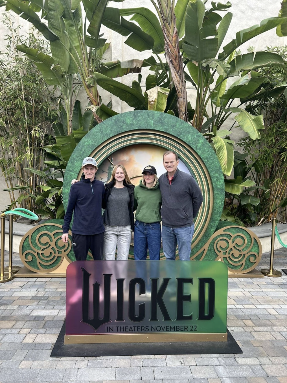 Paige Perkins '25 and Josie Perkins '23 seen with family at the movie theater to watch "Wicked". Photo credit to Paige Perkins '25. 