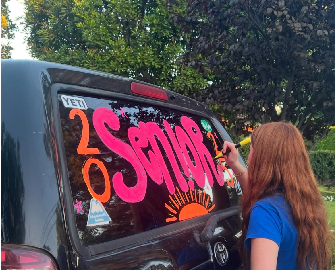 Senior Spirit! Jadyn Walsh '25 decorates her car on the first day of senior year. Photo by Julia Vasquez '25. 