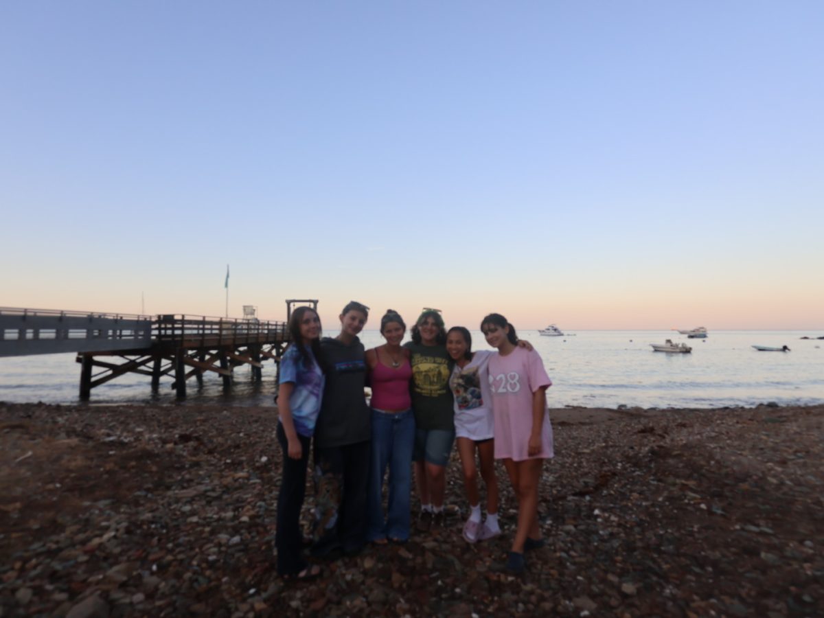 Pictured left to right: Addy Suckling ‘28, Zubi Sanchez ‘28, Jillian Jepson ‘28, Brooke Ballard ‘28, Mara Trazo ‘28 and Ruby Hudson ‘28 posing in front of a beautiful Catalina sunset.