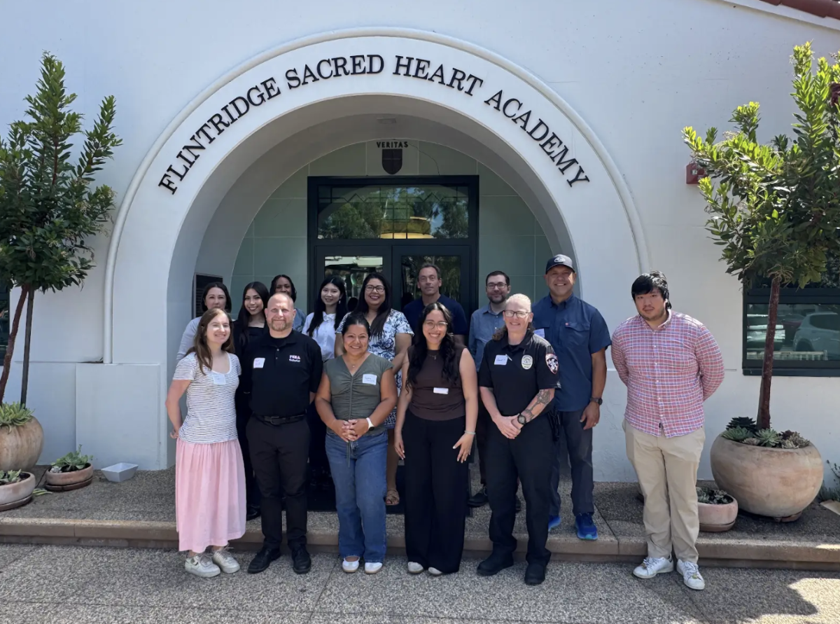 New faculty and staff at Flintridge Sacred Heart Academy gather at the school’s entrance.